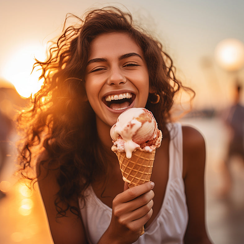 Woman laughing with ice cream